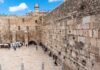 Western Wall Prayer: Felony or Faith? View of the Western Wall in Jerusalem with visitors