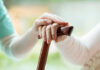 Euthanasia Nightmare: Elderly Woman’s Last-Minute “No” Ignored Hands resting on a wooden cane together