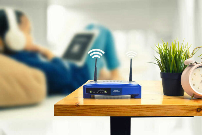 Router with antennas on a wooden table