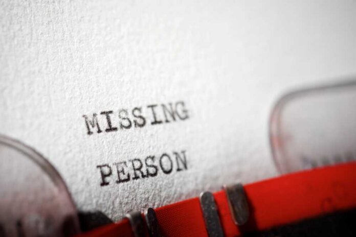 Close-up of a typewritten document stating 'MISSING PERSON'