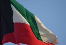 Kuwait national flag waving in the wind