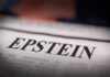 Close-up of a newspaper headline reading 'EPSTEIN'