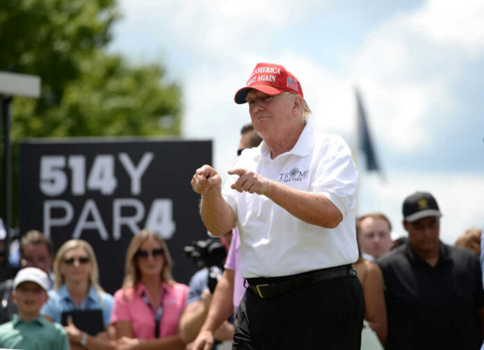 man in red cap