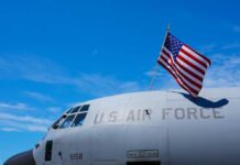 Close-up of a military aircraft with an American flag