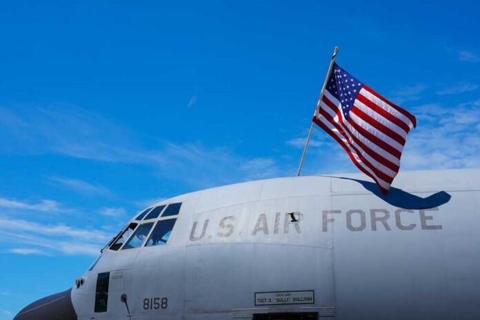 Close-up of a military aircraft with an American flag
