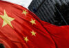 Chinese Satellites EXPOSE U.S. Troop Moves Close-up of the Chinese flag waving in the wind