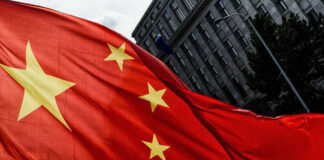 Close-up of the Chinese flag waving in the wind