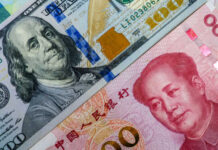 US hundred dollar bill and Chinese hundred yuan note