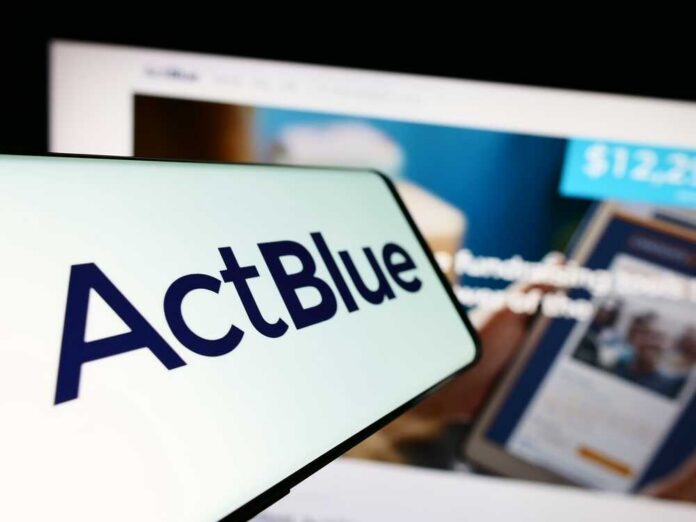 Stuttgart,,Germany,-,08-20-2023:,Mobile,Phone,With,Logo,Of,Fundraising Close-up of a mobile device displaying the ActBlue logo with a blurred background of a fundraising website