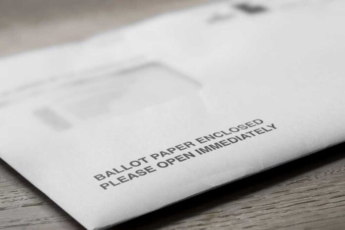 Vote-by-mail envelopes with U.S. flag design