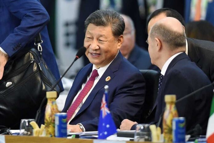 Two political leaders engaged in conversation at a conference