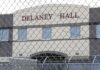 Protests Explode Outside NJ ICE Facility – Governor Demands Access Prisoner in orange jumpsuit sits on bunk in jail cell
