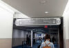 International Airports FACE Mullin’s Ultimatum Woman walking towards US customs and passport control