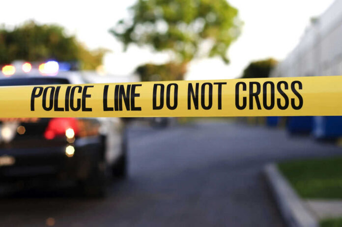 crime-scene-24948199 Yellow police tape with text police line do not cross