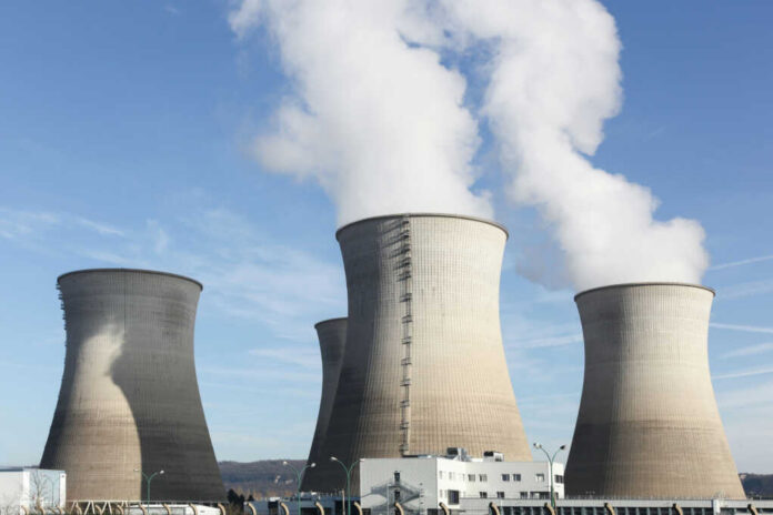 nuclear-power-plant2422024549jpg Cooling towers at a power plant releasing steam
