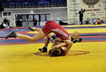 Girls’ Wrestling Video Triggers Probe School closed sign at entrance of a campus walkway