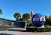 NASA logo and memorial wall featuring John F. Kennedy