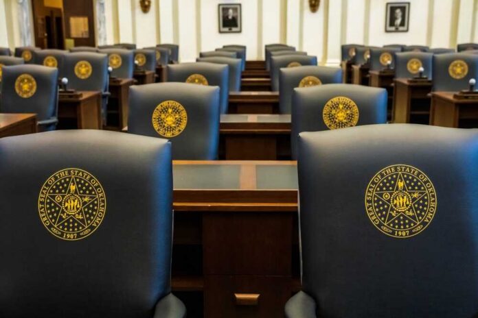 Oklahoma,City,,Oklahoma,-,March,29,,2023:,The,Center,Of A woman speaking at a podium during a press conference
