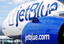 Scary JFK Close Call Sparks FAA Scrutiny Close-up of a JetBlue airplane showcasing its logo and engine