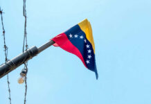 Twin Quakes Expose Venezuela’s Fragile System Venezuelan flag flying on a pole.