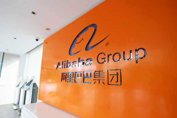 Hangzhou,cn-sep,10th,2018:alibaba,Group,Location,In,Hangzhou,zhejiang.,Alibaba,Group,Holding,Limited Alibaba Group logo on an orange wall in a modern office lobby