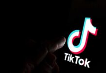 National Security Shrug — TikTok Declared ‘Safe’ TikTok logo on a smartphone screen