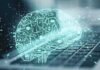 digital brain hologram over a laptop keyboard