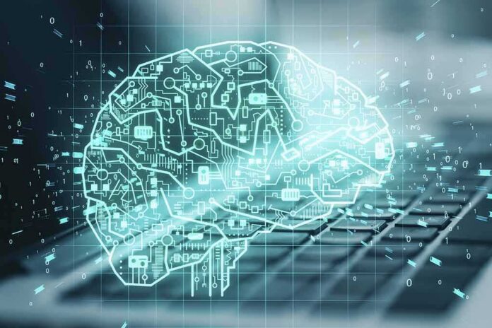 digital brain hologram over a laptop keyboard