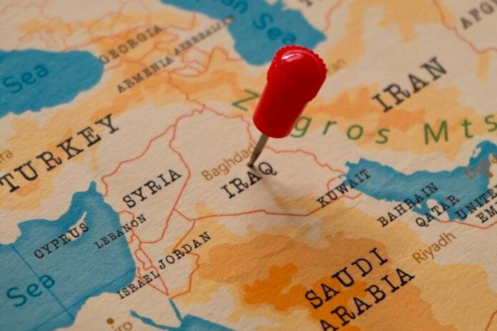A,Red,Pin,On,Baghdad,,Iraq,Of,The,World,Map A map of the Middle East with a red pin marking Iraq