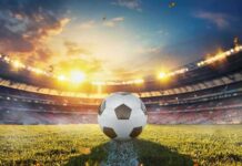 Neutrality Myth Shattered on World Stage Soccer ball on stadium field at sunset