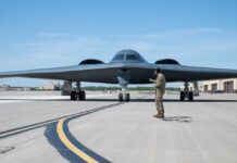 Bomber Gap Could Doom America A military personnel stands in front of a B-2 Spirit stealth bomber on an airfield