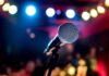 Microphone on stage under colorful lights