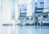 Deportation Whiplash Cripples Hospital Floors Hospital beds on wheels in a bright corridor