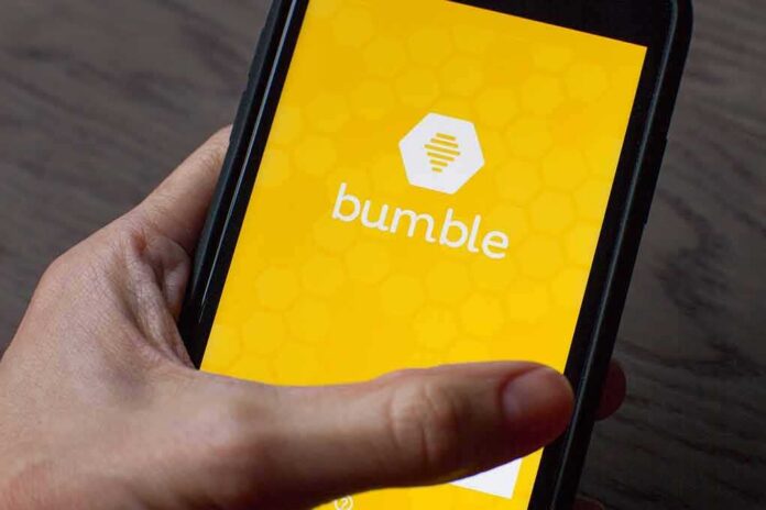 smartphone displaying the Bumble app splash screen