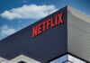 Netflix logo on modern office building exterior