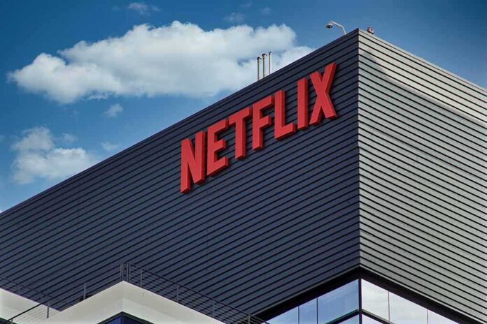 shutterstock_2062987472 Netflix logo on modern office building exterior