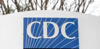 CDC sign on building facade