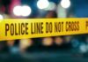 Yellow police tape with do not cross warning