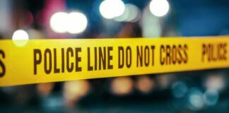 Yellow police tape with do not cross warning