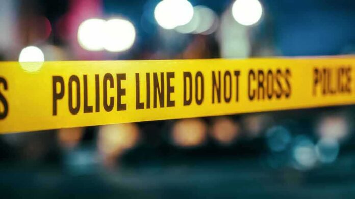 Yellow police tape with do not cross warning