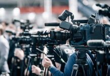 Pride Night Clash: Bible Verse Stuns MLB Broadcast cameras on tripods at a press event