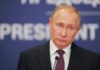 Putin’s 72-Hour Gambit — Kushner At Table man in suit at podium with microphone