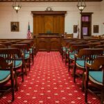 Oklahoma Execution Day: Justice for Brutal Hammer Murder Courtroom with wooden benches facing the judge's bench