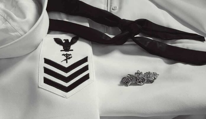 shutterstock_516951724-1 Navy dress uniform with rank chevrons and insignia