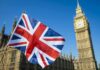 Rebels Corner Westminster – Shock Pact Dares The Crown Union Jack flag with Elizabeth Tower in the background