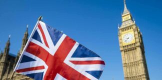 Union Jack flag with Elizabeth Tower in the background