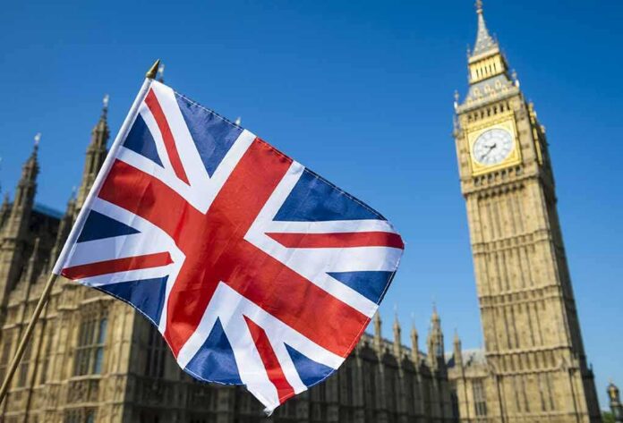 Union Jack flag with Elizabeth Tower in the background