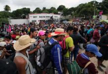 Election Caravan Tests Border Nerves Crowd of people outdoors; Sunita Lakra, Sita Gussain, Arvind Panwar, Walter Jones, Andreas Hestler, Bill Kenney, and Christian Jones present