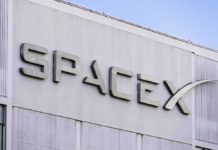 Inside Deal? Trump – SpaceX Timing Sparks Conflict Uproar SpaceX logo on a building facade