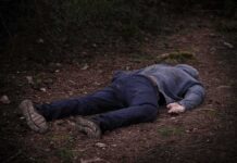 Philly House of Horrors – 5 Dead, Dozens More Possible person lying face down on a forest path